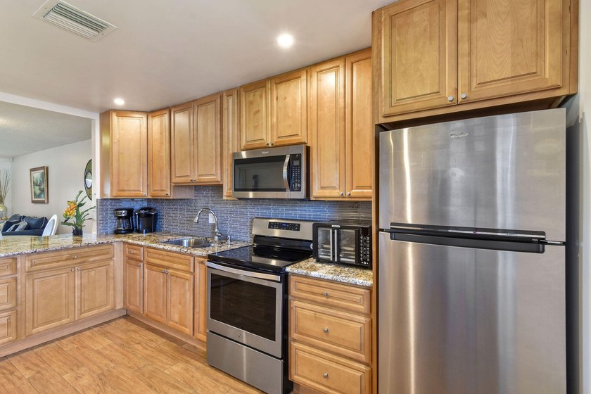 Move-in ready home in a desirable 55+ community offering comfort - photo 9