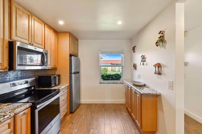 Move-in ready home in a desirable 55+ community offering comfort - photo 10