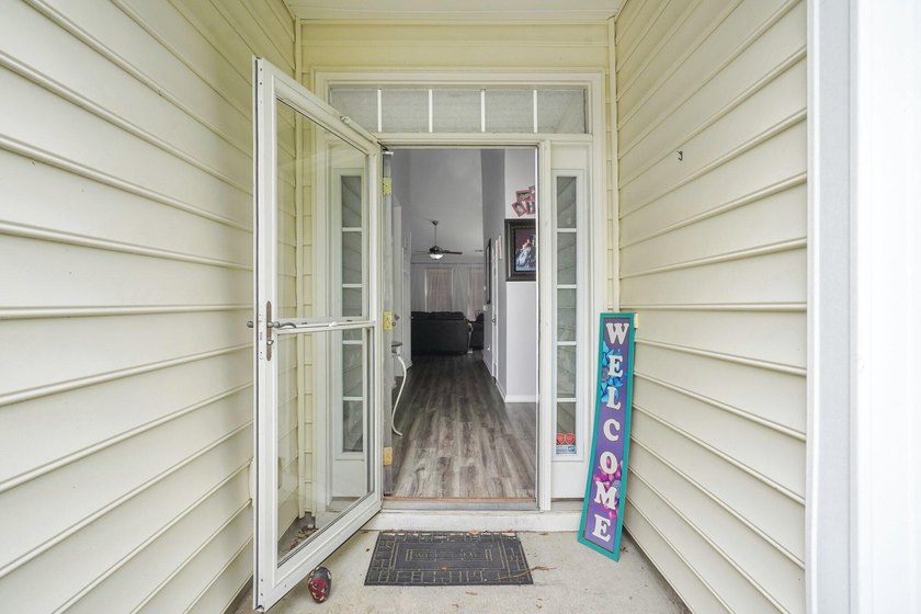 Welcome to 8023 Hyannis Court! This beautiful 4-bedroom, 2-bath - photo 3