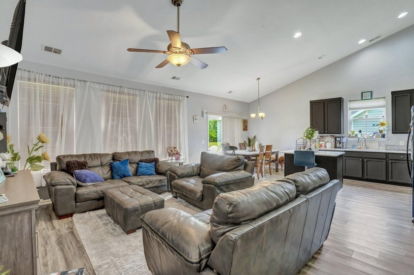 Welcome to 8023 Hyannis Court! This beautiful 4-bedroom, 2-bath - photo 6