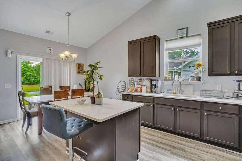 Welcome to 8023 Hyannis Court! This beautiful 4-bedroom, 2-bath - photo 8
