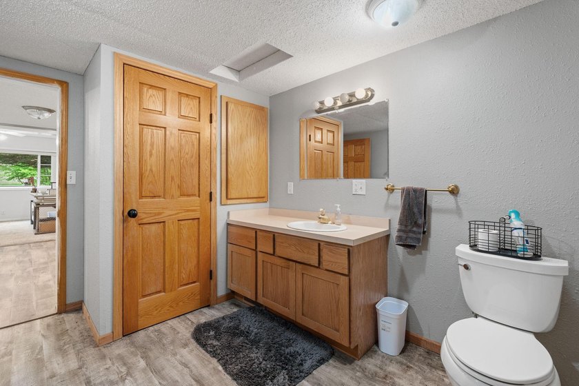 Enjoy private, peaceful one-level living just a short walk from - photo 12
