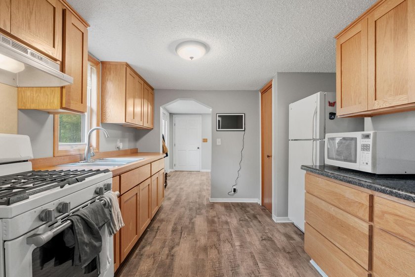 Enjoy private, peaceful one-level living just a short walk from - photo 13