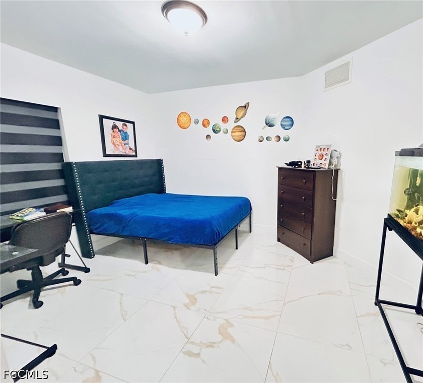 Remodeled and move-in ready, this beautiful Cape Coral home - photo 8