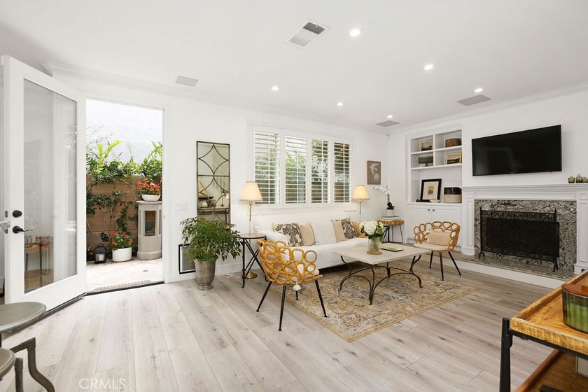 Welcome to 302 Canoe Pond, where modern coastal living meets - photo 3