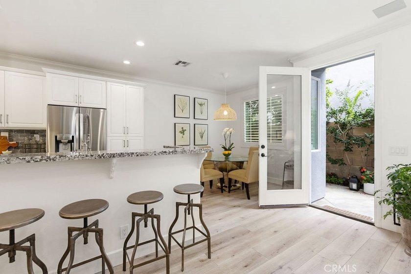 Welcome to 302 Canoe Pond, where modern coastal living meets - photo 5