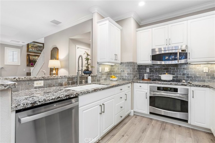Welcome to 302 Canoe Pond, where modern coastal living meets - photo 6