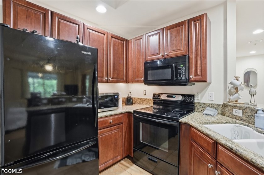 Do not miss this beautifully maintained first-floor condo in the - photo 6