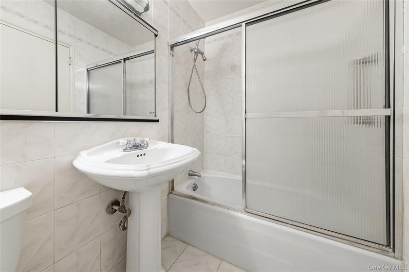 Unit 6E at the Forest Hills is now on the market! A junior four - photo 6