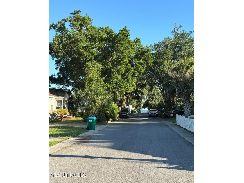 BUILDABLE LOT CLOSE TO BEACH AND GULF . PRICE IS - photo 2
