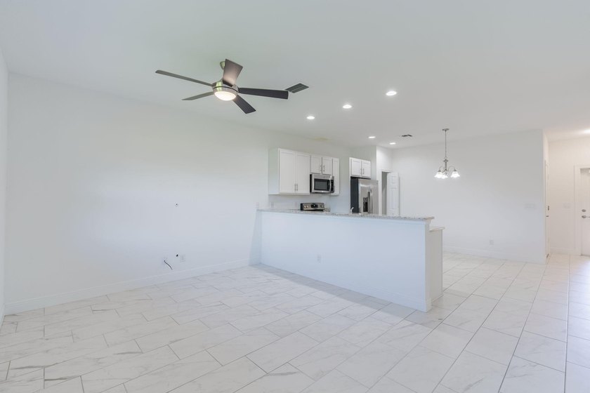 SELLER OFFERING $5,000 CREDIT TO BUYER at closing for a - photo 8