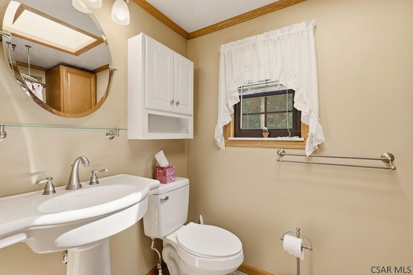 Welcome to 313 Naylor Road, a captivating 1.5-story residence - photo 31