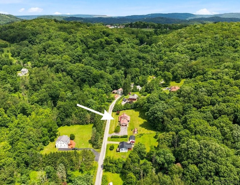 Welcome to 313 Naylor Road, a captivating 1.5-story residence - photo 49