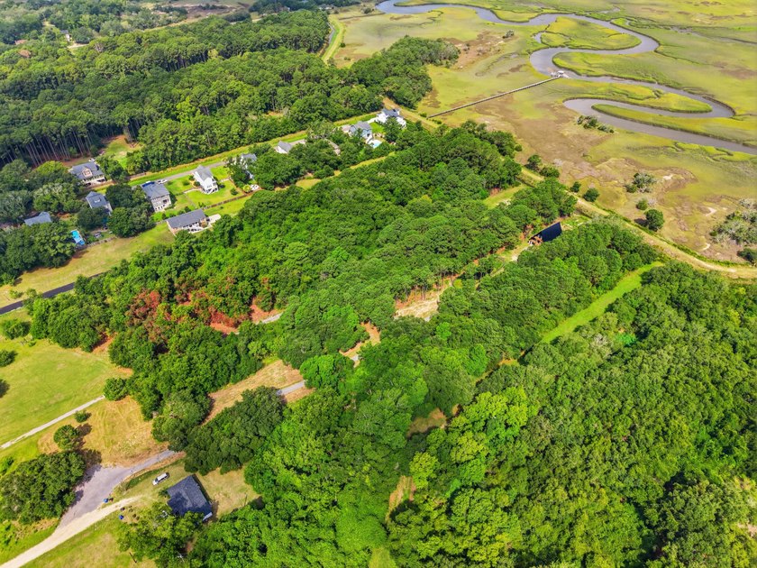 This private, wooded 0.80-acre homesite offers an outstanding - photo 8