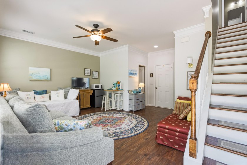 Welcome to this sophisticated and coveted end-unit townhome in - photo 3