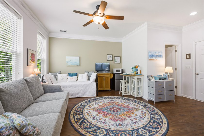 Welcome to this sophisticated and coveted end-unit townhome in - photo 4