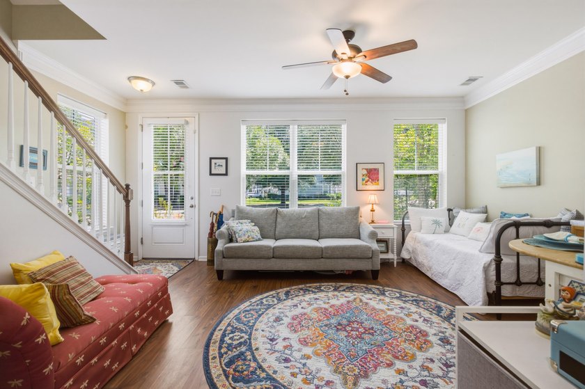 Welcome to this sophisticated and coveted end-unit townhome in - photo 6