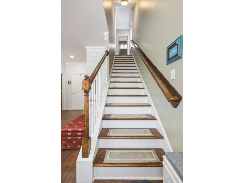 Welcome to this sophisticated and coveted end-unit townhome in - photo 7