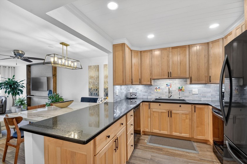 Experience sophisticated coastal living in this exquisitely - photo 8