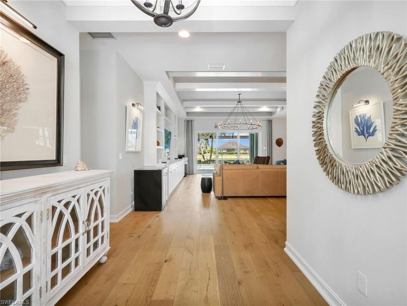 Move in ready and loaded with upgrades, this custom built Stock - photo 7