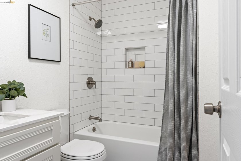 Top floor sun-splashed 2 Bedroom and 1 bath updated condo is - photo 14