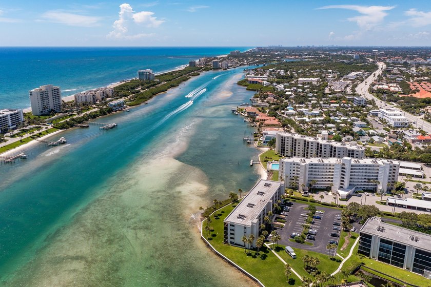 This remodeled condo offers breathtaking views of the turquoise - photo 3
