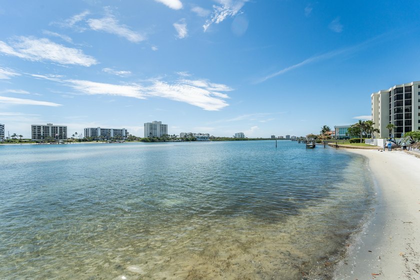 This remodeled condo offers breathtaking views of the turquoise - photo 6