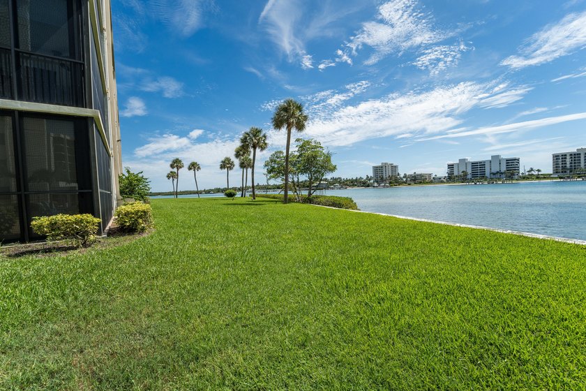 This remodeled condo offers breathtaking views of the turquoise - photo 8