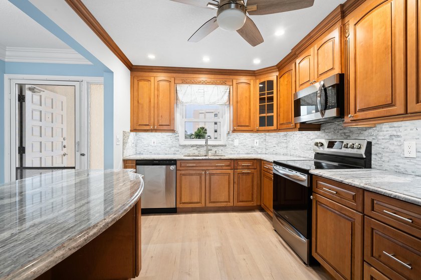 This remodeled condo offers breathtaking views of the turquoise - photo 9