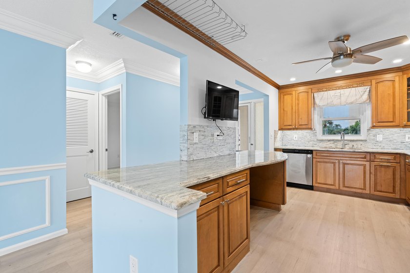 This remodeled condo offers breathtaking views of the turquoise - photo 10
