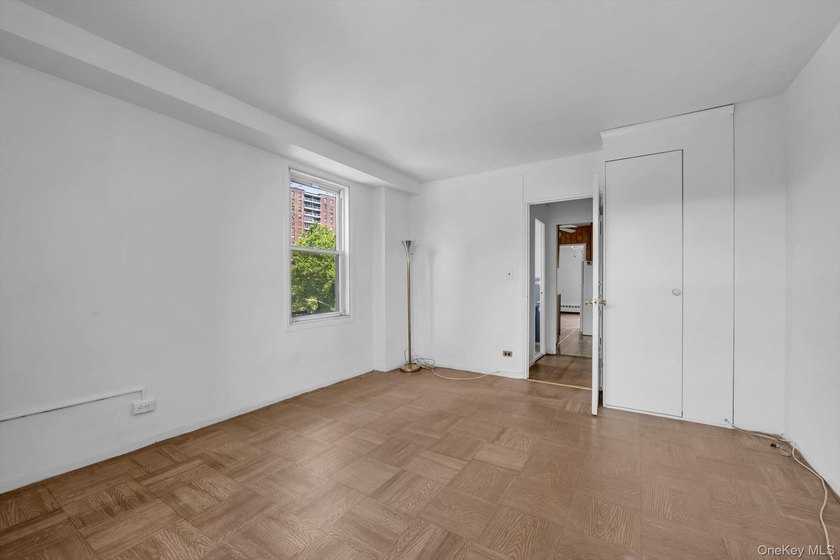 Welcome to this spacious and inviting 2-bedroom, 1-bath co-op - photo 11