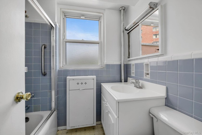 Welcome to this spacious and inviting 2-bedroom, 1-bath co-op - photo 13