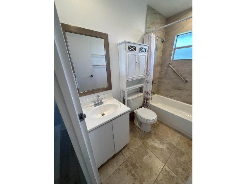 Welcome home to this tastefully remodeled second floor, two - photo 13