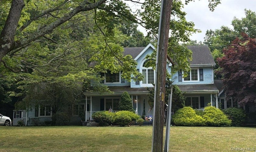 This Colonial Style Home Features 4 Bedrooms, 2.5 Baths, Formal - photo 3