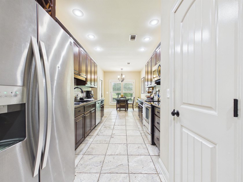 Beautiful 3 bed, 2 bath brick home on the golf course in The - photo 10