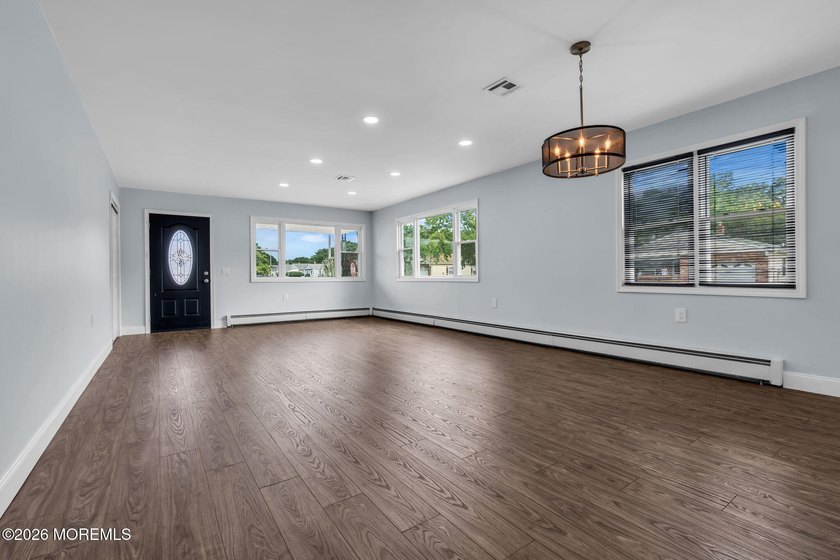 Welcome to 2 Ashcroft Lane, a charming 2-bed, 2-bath Lakeview - photo 2