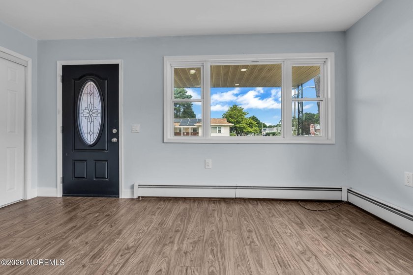 Welcome to 2 Ashcroft Lane, a charming 2-bed, 2-bath Lakeview - photo 3