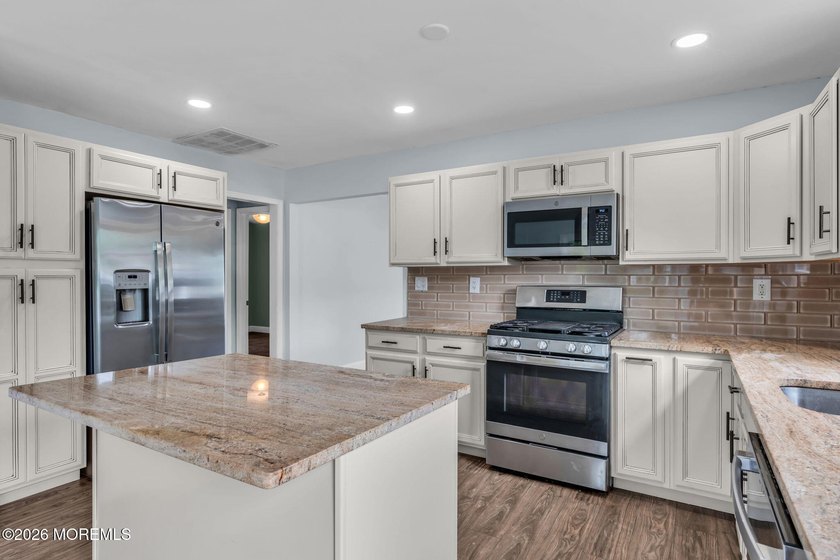 Welcome to 2 Ashcroft Lane, a charming 2-bed, 2-bath Lakeview - photo 7