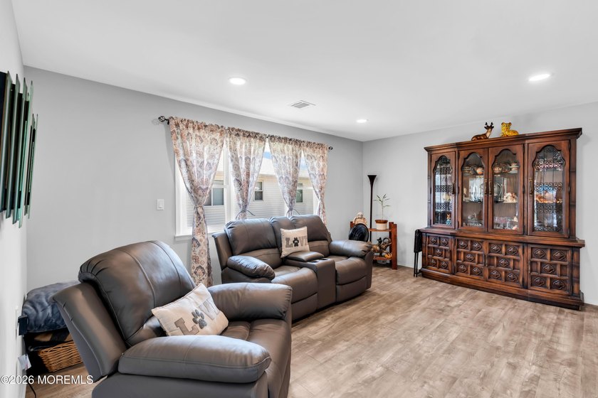 Welcome to this warm and inviting 2-bedroom, 1-bath home in the - photo 7