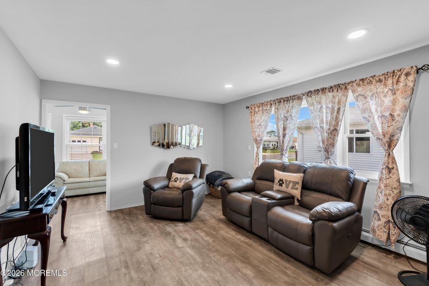 Welcome to this warm and inviting 2-bedroom, 1-bath home in the - photo 8