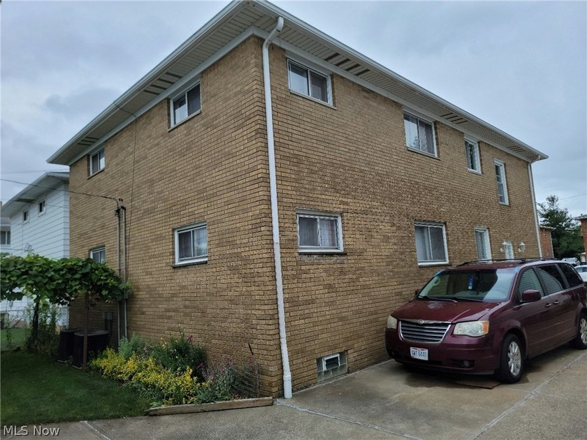 Charming Euclid Brick Duplex. The property at 535-537 E 208th St - photo 3