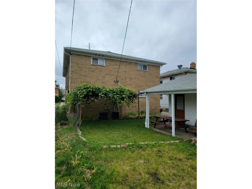 Charming Euclid Brick Duplex. The property at 535-537 E 208th St - photo 5