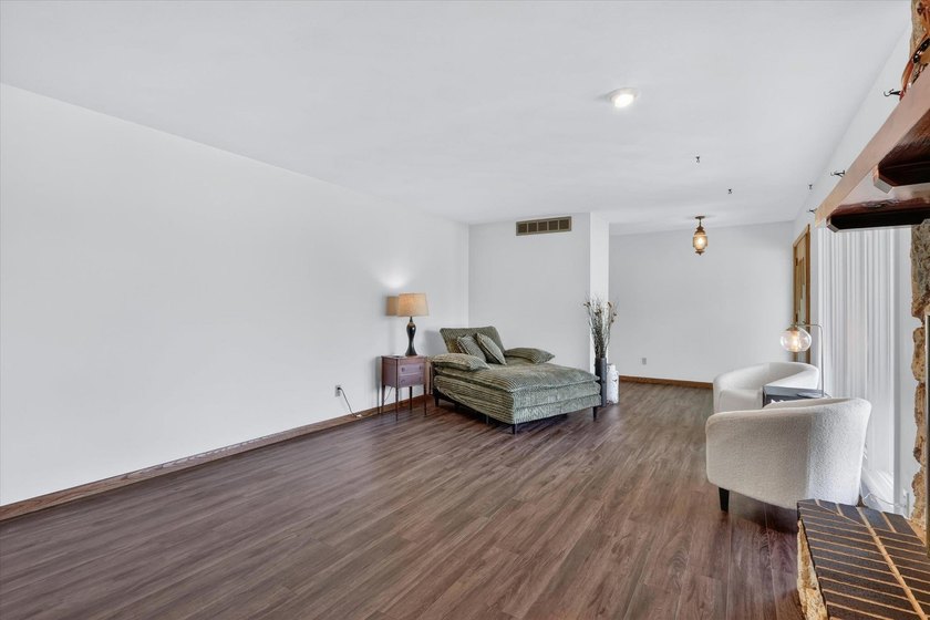 All-brick home offering space and comfort throughout! Features a - photo 8