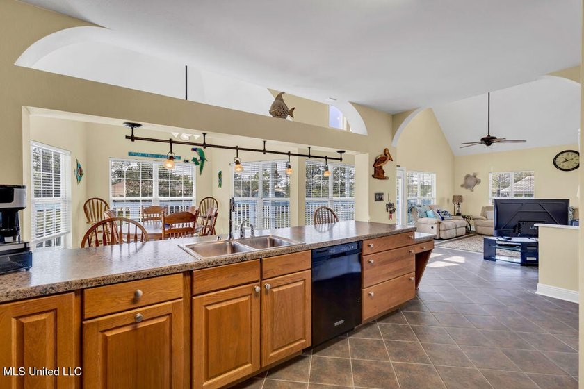 Located on a spacious waterfront lot in Bay St. Louis, this - photo 14