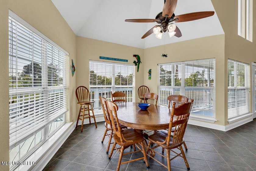 Located on a spacious waterfront lot in Bay St. Louis, this - photo 19