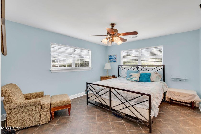 Located on a spacious waterfront lot in Bay St. Louis, this - photo 21