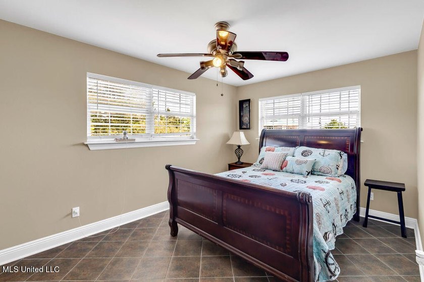 Located on a spacious waterfront lot in Bay St. Louis, this - photo 27