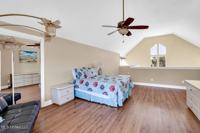 Located on a spacious waterfront lot in Bay St. Louis, this - photo 31