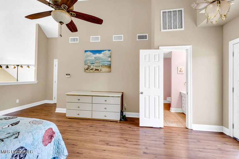 Located on a spacious waterfront lot in Bay St. Louis, this - photo 32
