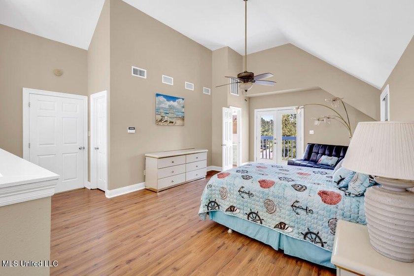 Located on a spacious waterfront lot in Bay St. Louis, this - photo 33
